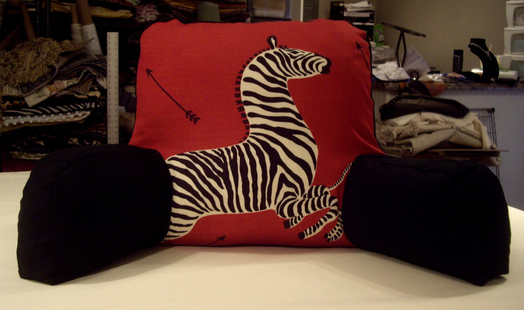Bed rest pillow in Red 'Zebras'.